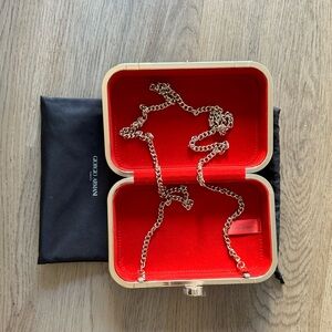 Giorgio Armani clutch with crossbody strap